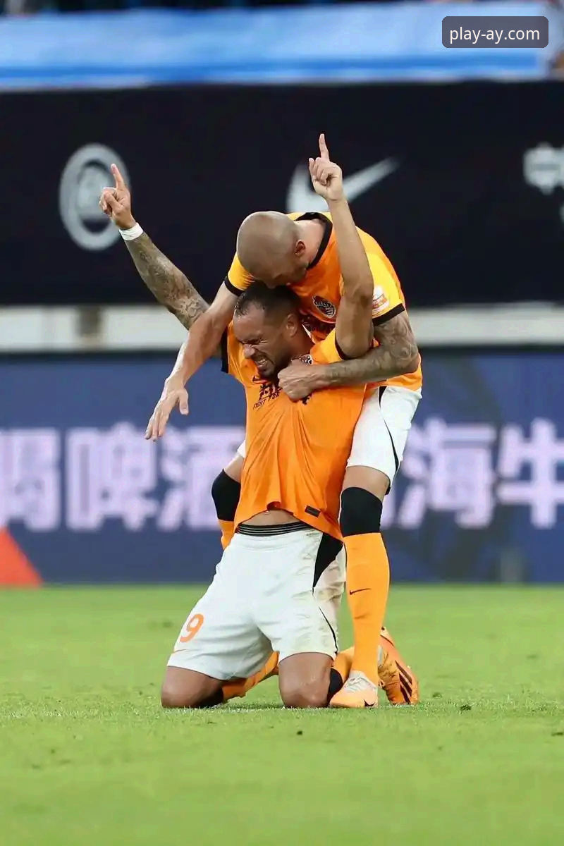 青岛海牛3-1力克上海海港深度评测：13年等待的胜利，爱游戏平台观赛体验全解析